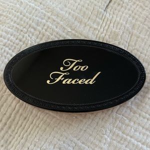 Too Faced Turn Up The Light Complexion-Enhancing Highlight Palette in “Light”